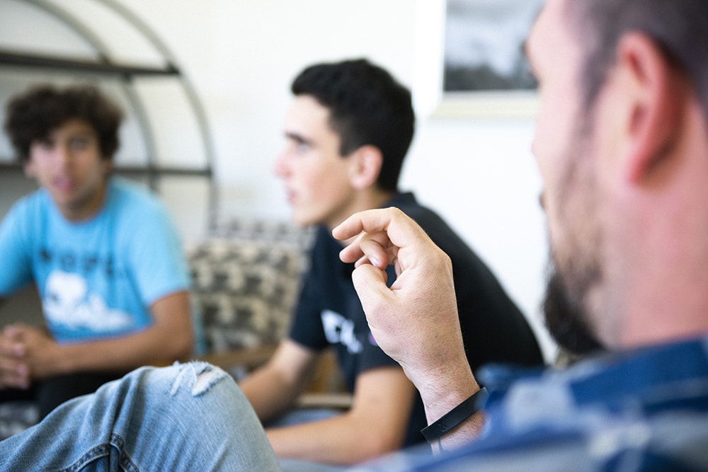 group of teen talking