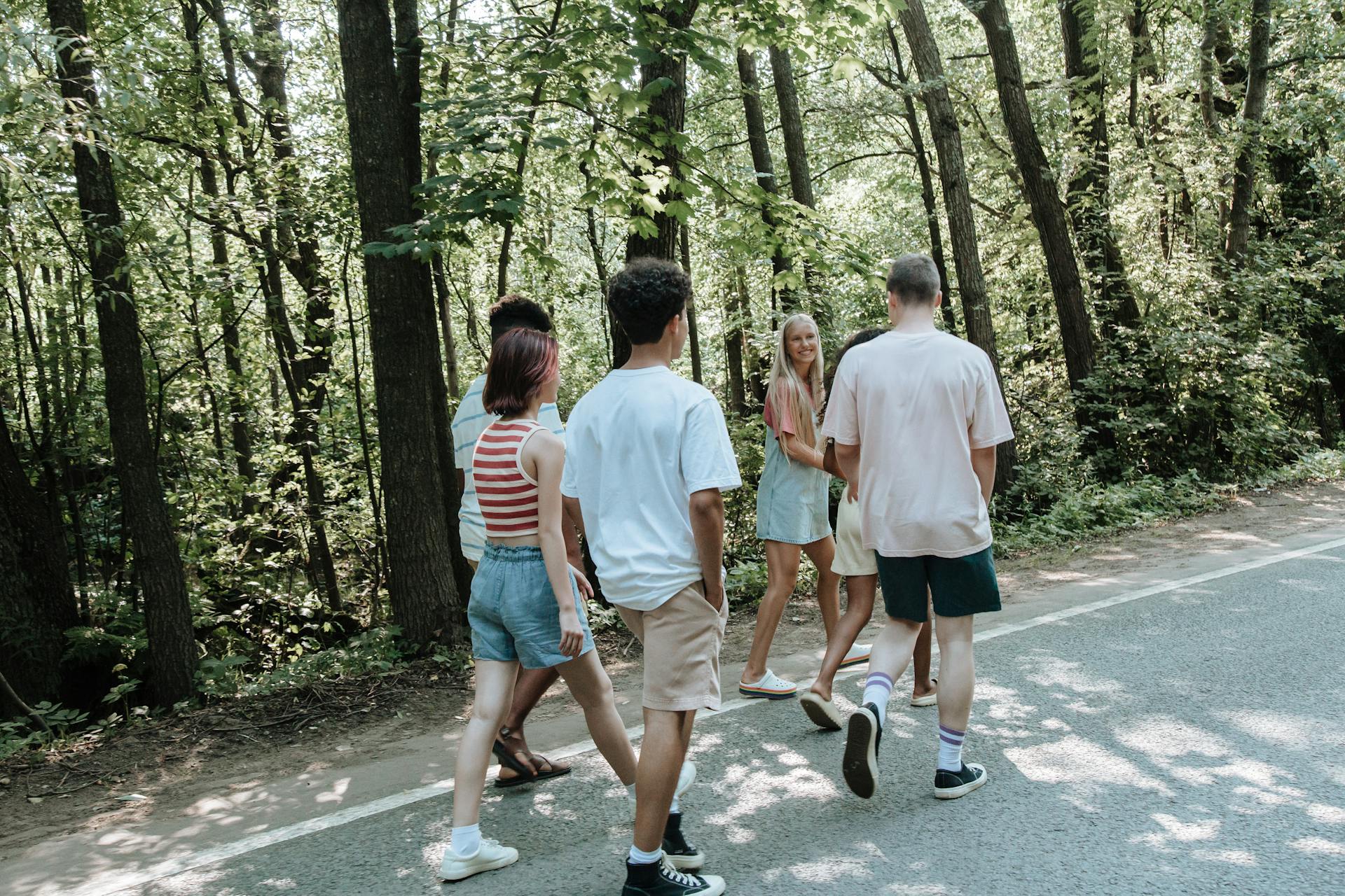 Group of teens taking a walk on a Muir wood property